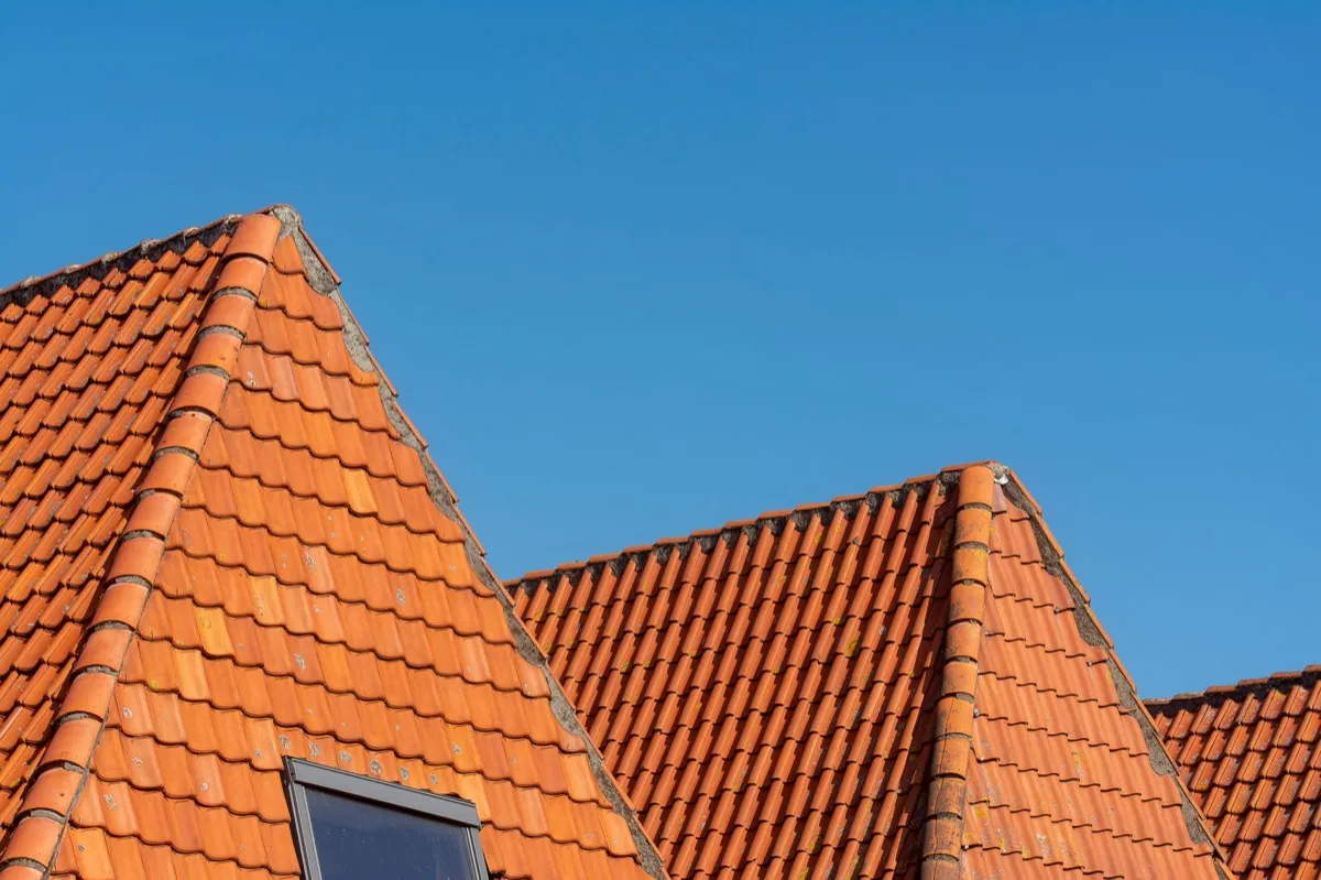 Clay barrel tile rooflines on homes in Blue Springs, MO